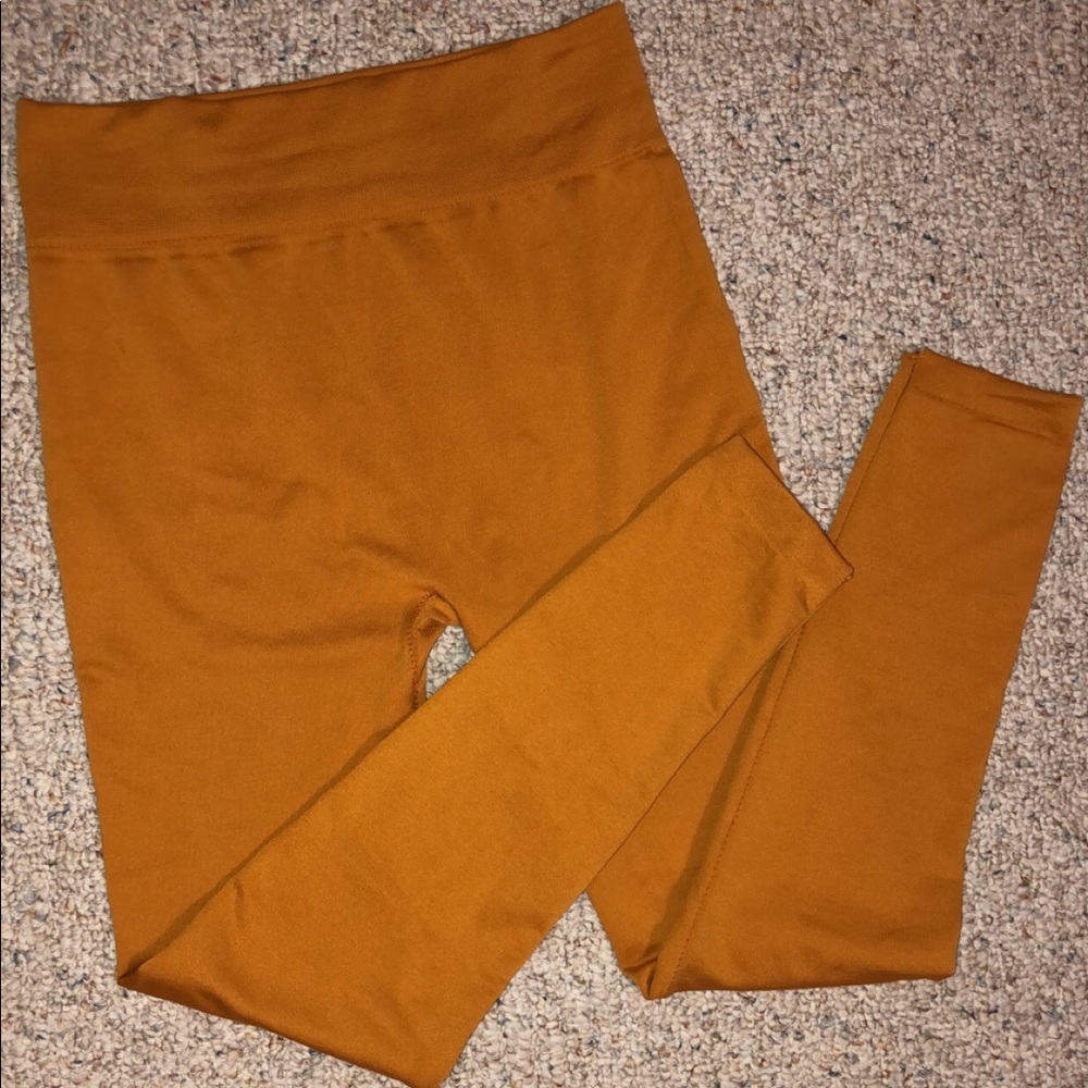 New Mix mustard color leggings, size medium. Very stretchy and warm